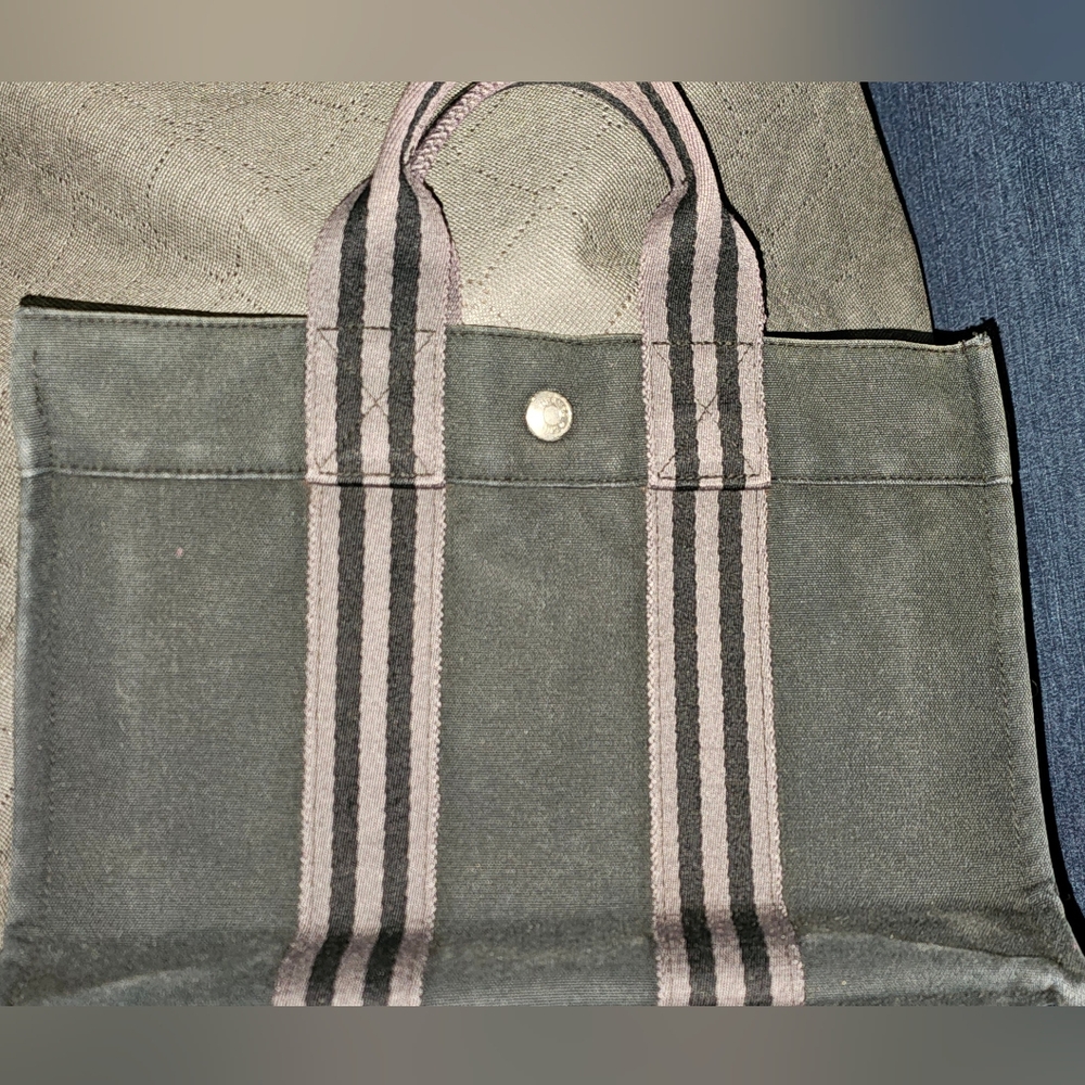 Authentic Hermes Small Black Tote with gray and black handle straps.